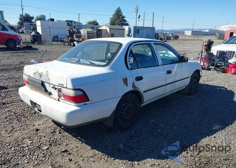 1997 Toyota Corolla Std z USA, uszkodzony, nr VIN 1NXBA02E5VZ608848